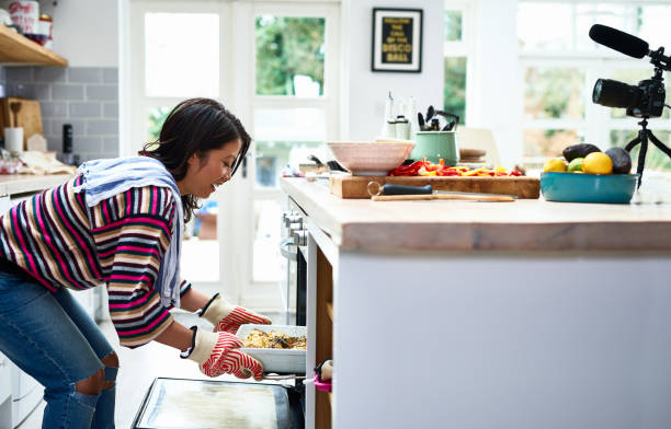 Caregiver cooking a nutritious meal for elderly client