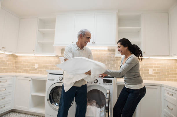 Caregiver organizing a clean living room